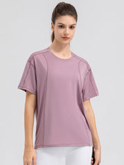 Top deportivo de manga corta y cuello redondo