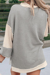 Blusa de manga larga con cuello en V y bloques de color