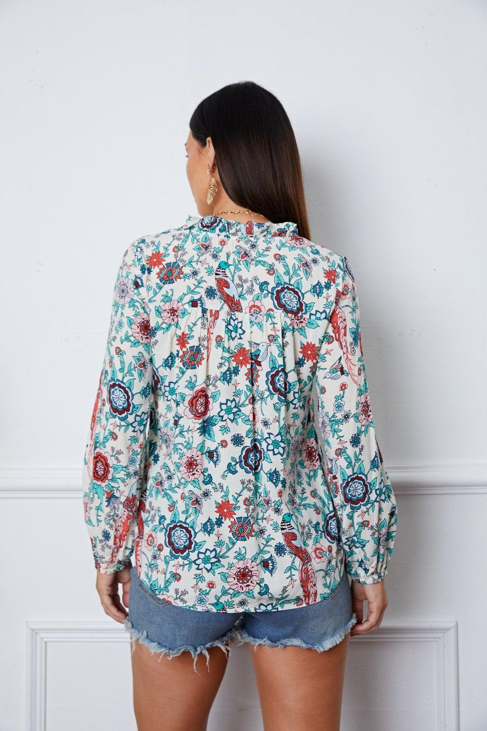 Blusa de manga larga con muescas y estampado floral