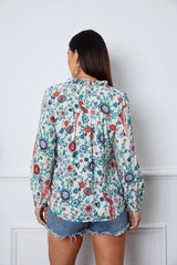 Blusa de manga larga con muescas y estampado floral