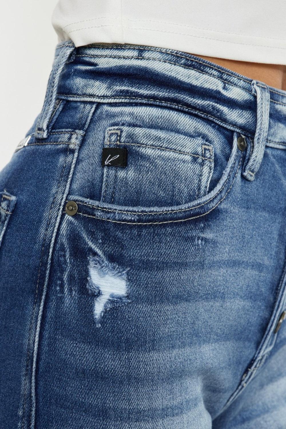 Pantalones cortos de mezclilla con dobladillo sin rematar y tiro alto con bragueta abotonada de Kancan