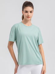 Top deportivo de manga corta y cuello redondo