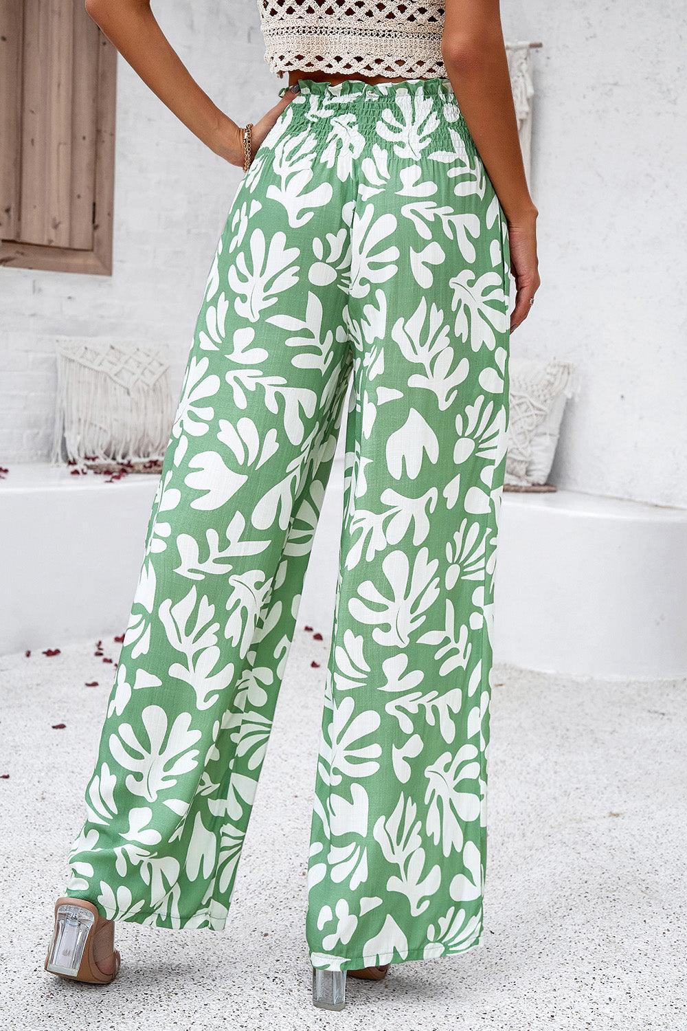 Pantalones anchos con bolsillos y estampado fruncido