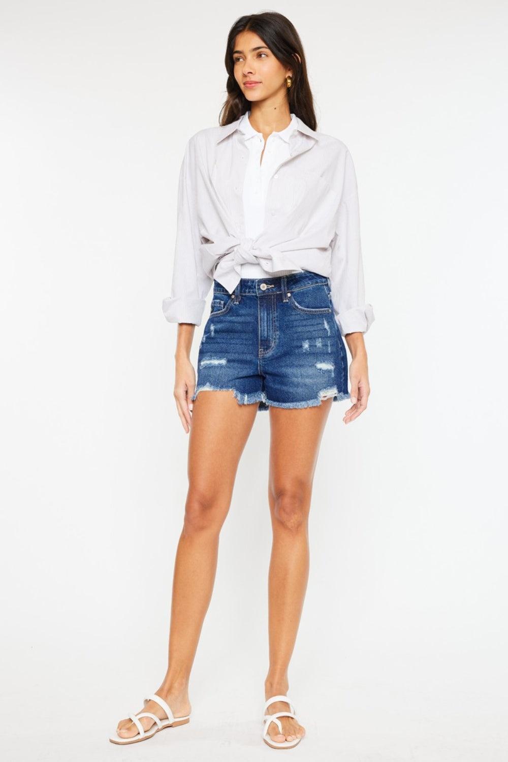 Shorts vaqueros de tiro alto con dobladillo deshilachado Kancan