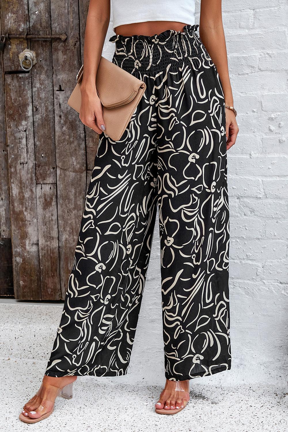 Pantalones anchos con bolsillos y estampado fruncido