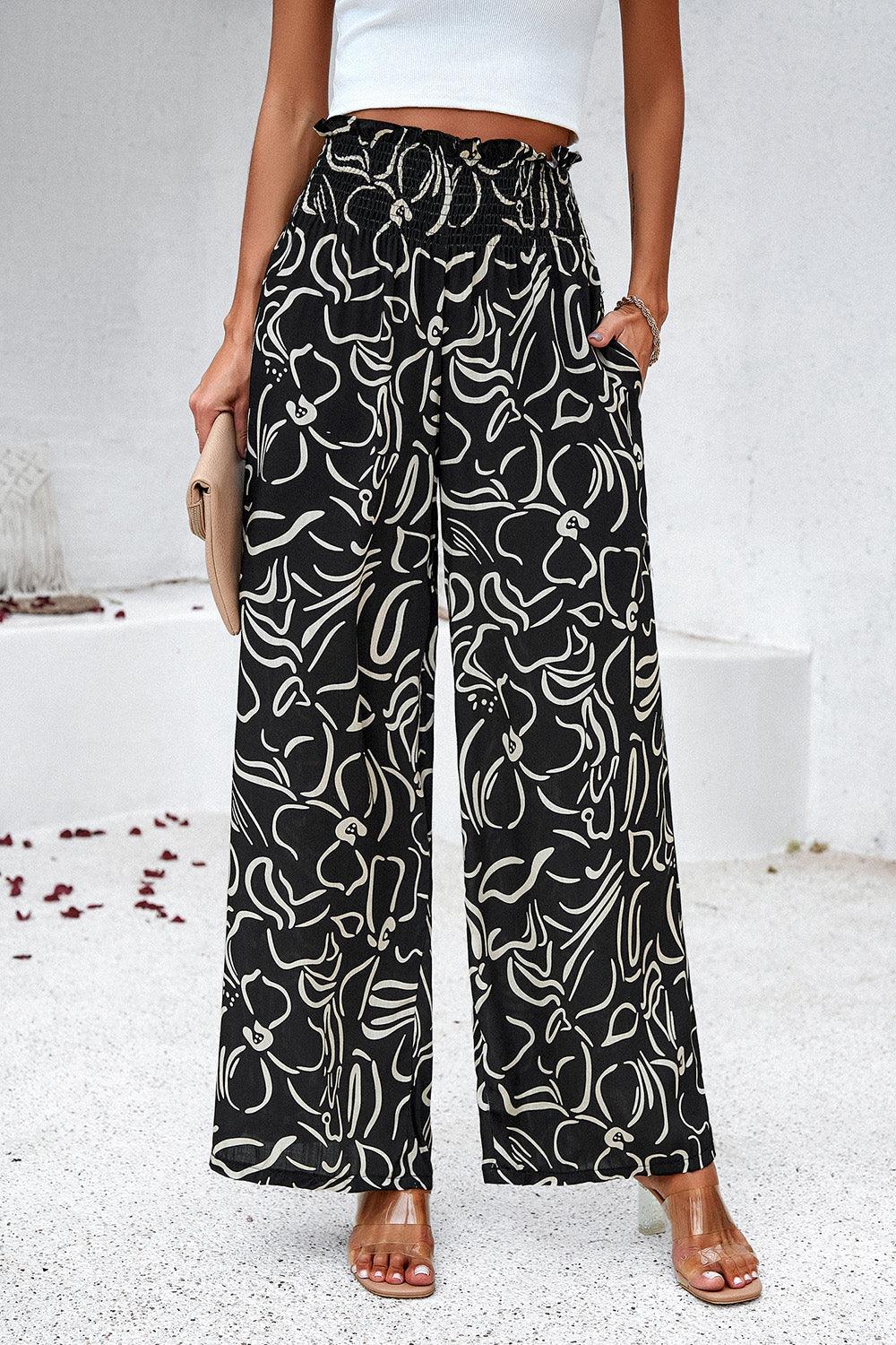 Pantalones anchos con bolsillos y estampado fruncido