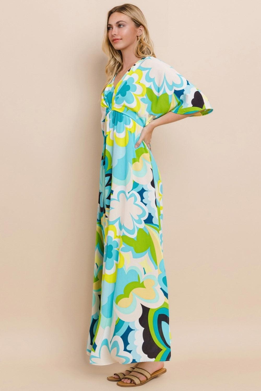 Vestido largo con abertura y estampado floral de ODDI