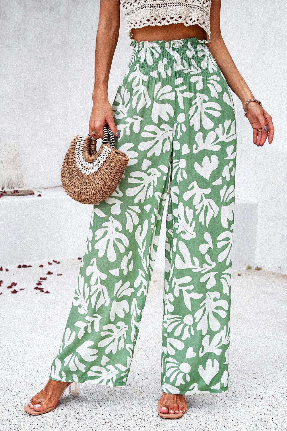 Pantalones anchos con bolsillos y estampado fruncido