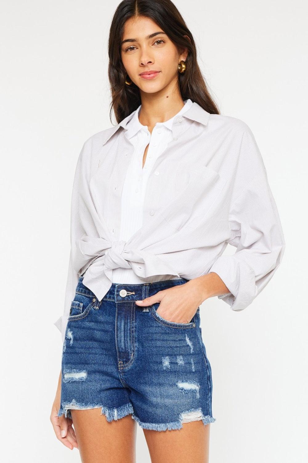 Shorts vaqueros de tiro alto con dobladillo deshilachado Kancan