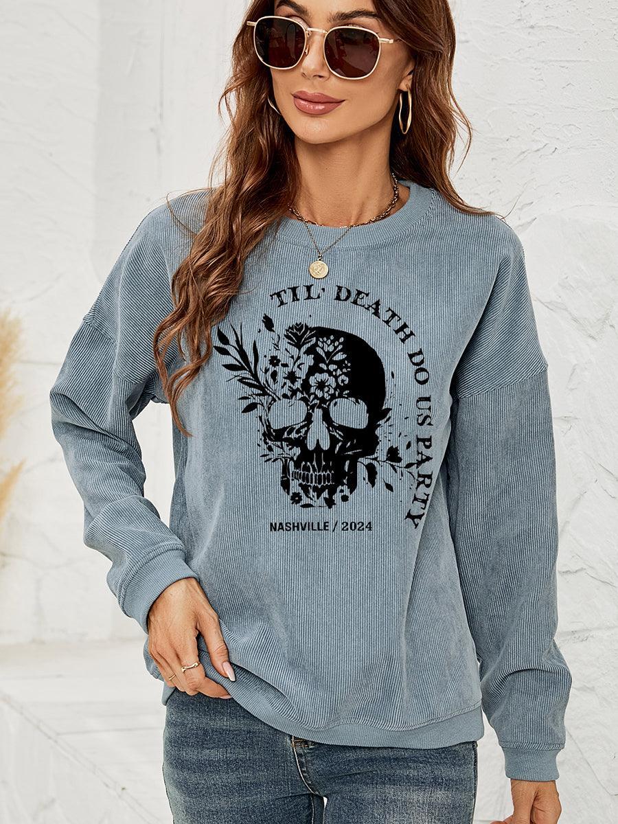 Sudadera con hombros caídos y estampado de calavera