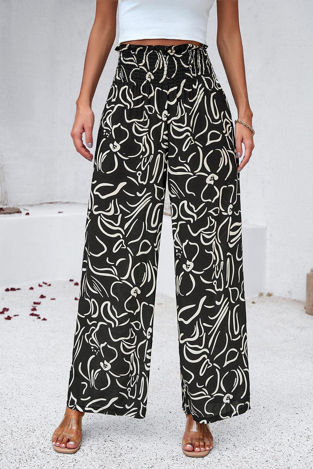 Pantalones anchos con bolsillos y estampado fruncido