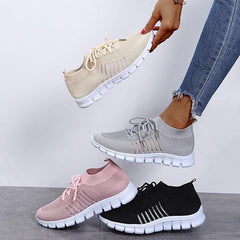 Zapatillas deportivas con cordones y malla transpirable