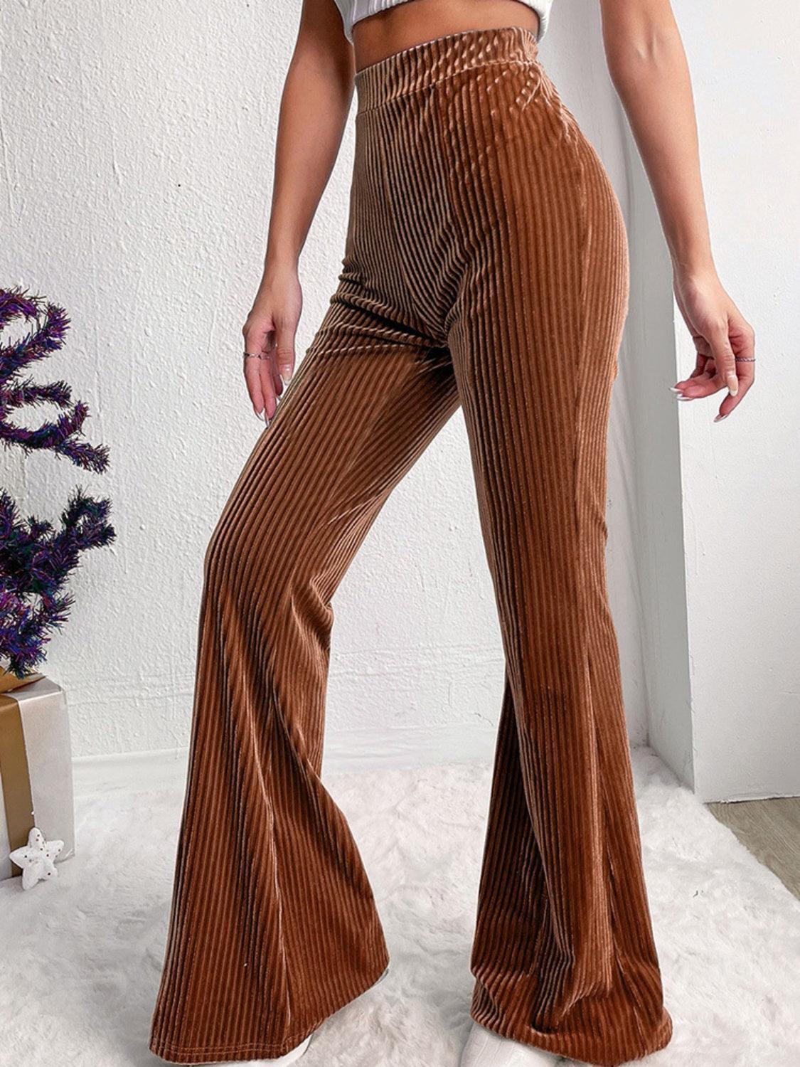 Pantalones de tiro alto con canalé y corte acampanado
