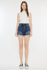 Shorts vaqueros con bragueta de botones y bajo sin rematar Kancan