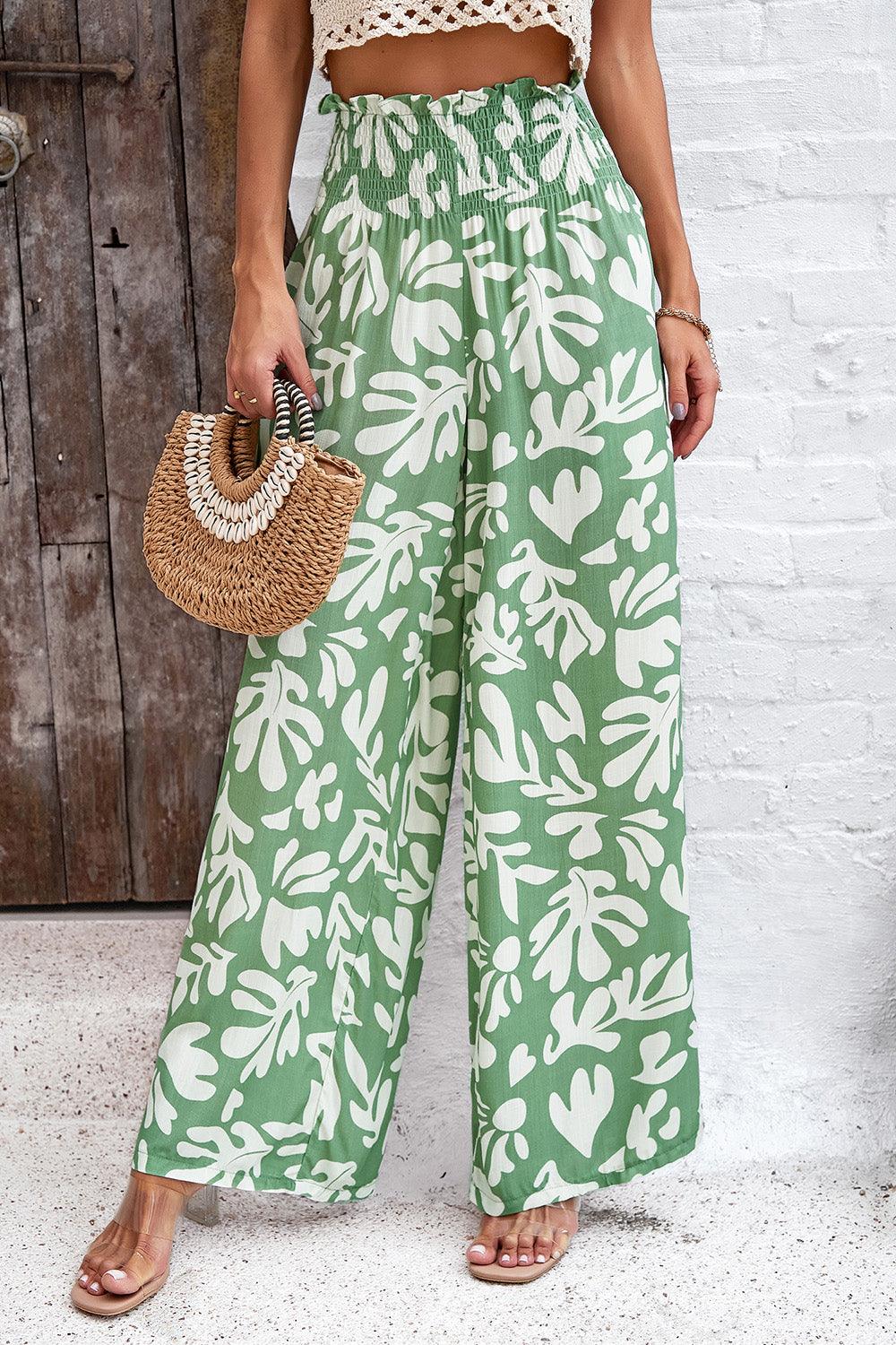 Pantalones anchos con bolsillos y estampado fruncido