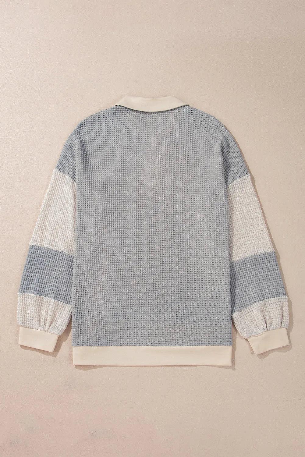 Blusa de manga larga con cuello en V y bloques de color