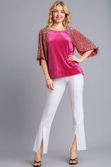 Blusa de terciopelo con mangas abullonadas y cuello redondo de leopardo de Umgee