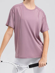 Top deportivo de manga corta y cuello redondo