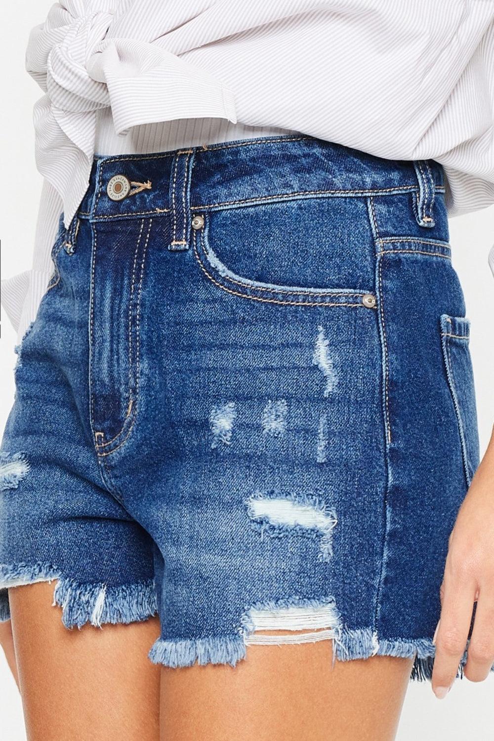 Shorts vaqueros de tiro alto con dobladillo deshilachado Kancan
