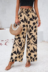 Pantalones anchos con bolsillos y estampado fruncido