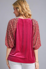 Blusa de terciopelo con mangas abullonadas y cuello redondo de leopardo de Umgee