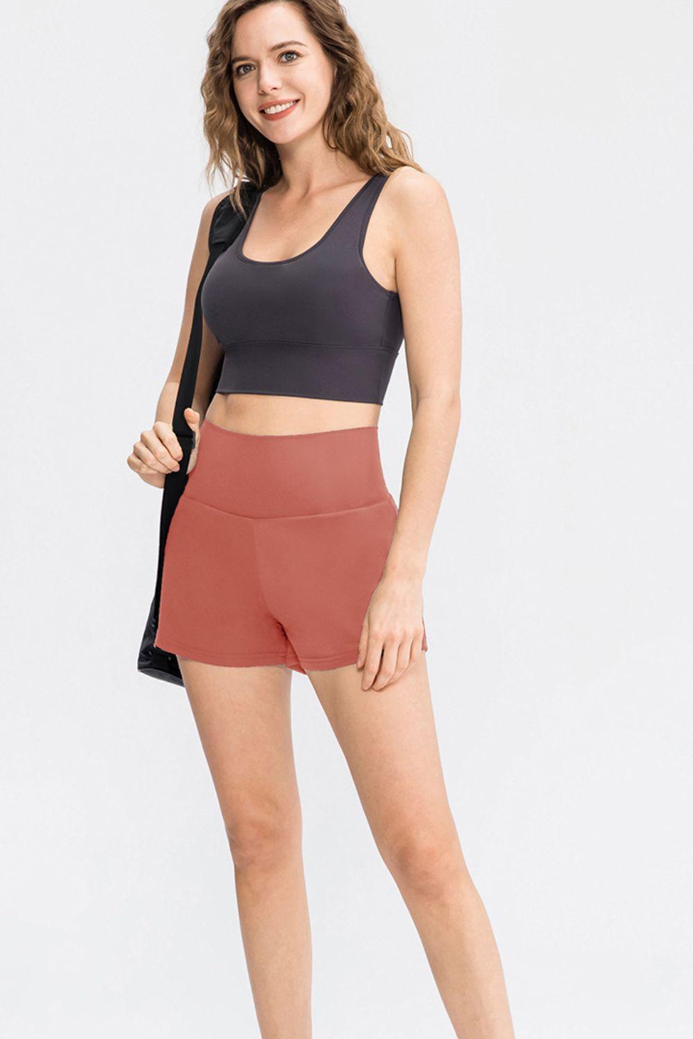 Pantalones cortos deportivos con cintura ancha y bolsillos