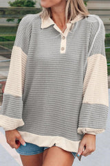 Blusa de manga larga con cuello en V y bloques de color