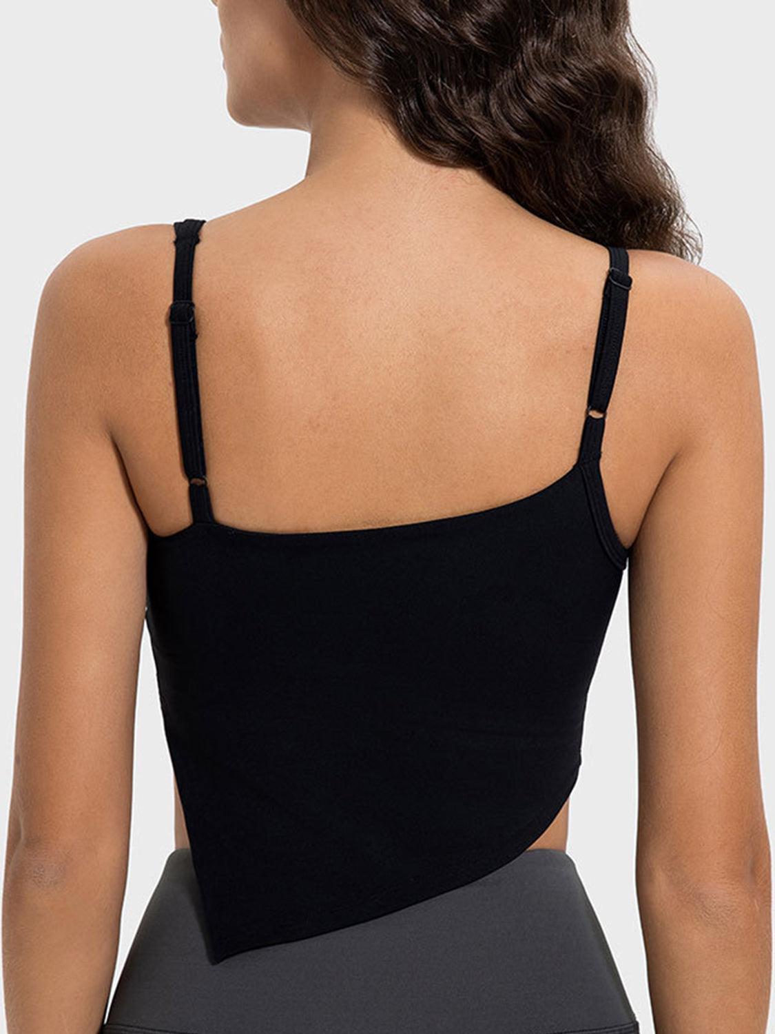 Camisola deportiva con escote asimétrico y abertura