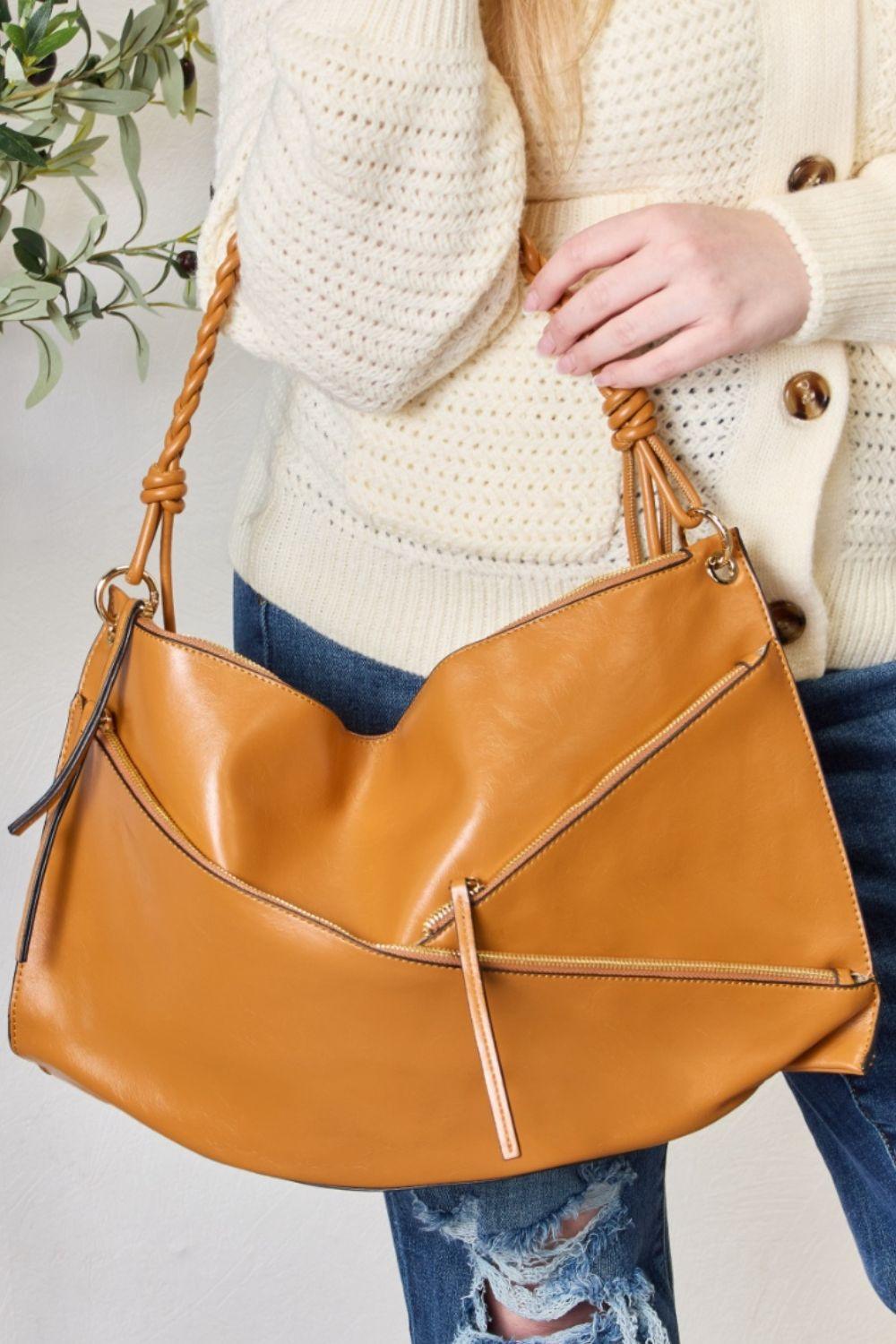Bolso de hombro con detalle de cremallera y estuche SHOMICO