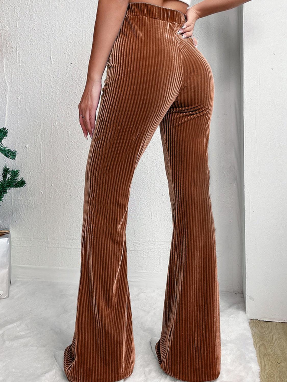Pantalones de tiro alto con canalé y corte acampanado