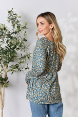 Blusa de manga larga con botones y estampado floral de tamaño completo de Heimish