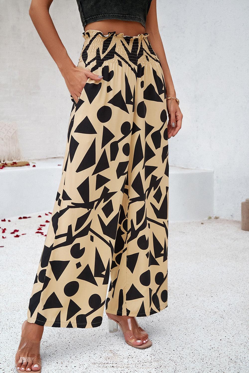 Pantalones anchos con bolsillos y estampado fruncido